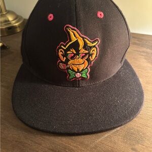 Black and Pink Baseball Hat with Animal Logo